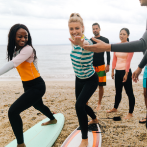 “Wave” Hello To Your New Workout Routine! The Health Benefits Of Surfing